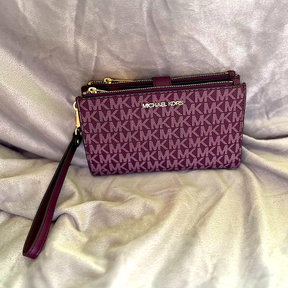 Michael Kors Wristlet, new purple color.